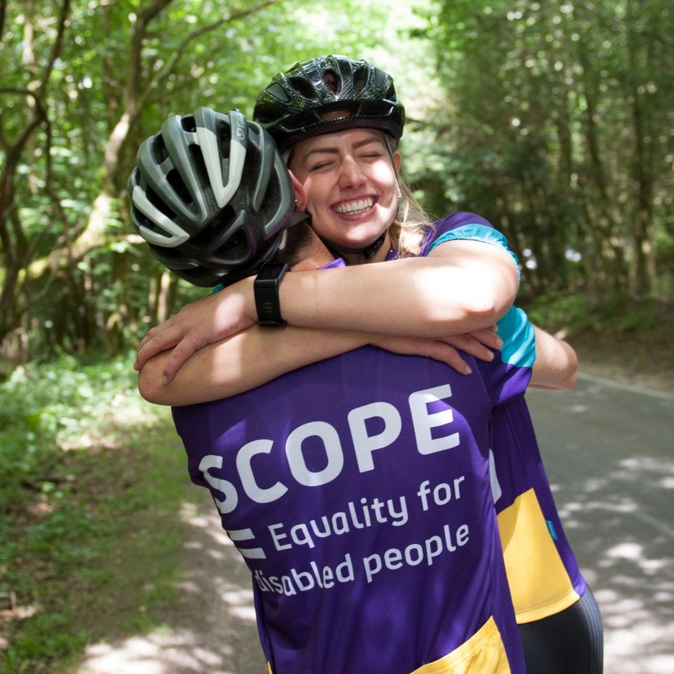 The Team creative branding agency. Scope rebrand a game-changing brand accessible design cyclists hugging